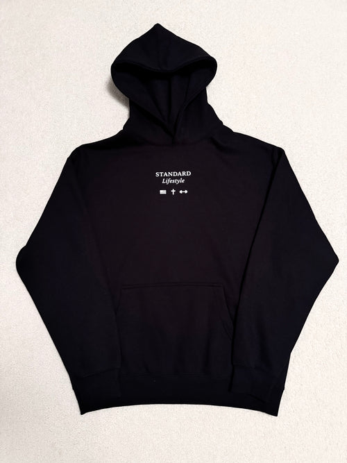 Black pullover front flat lay with small chest logo